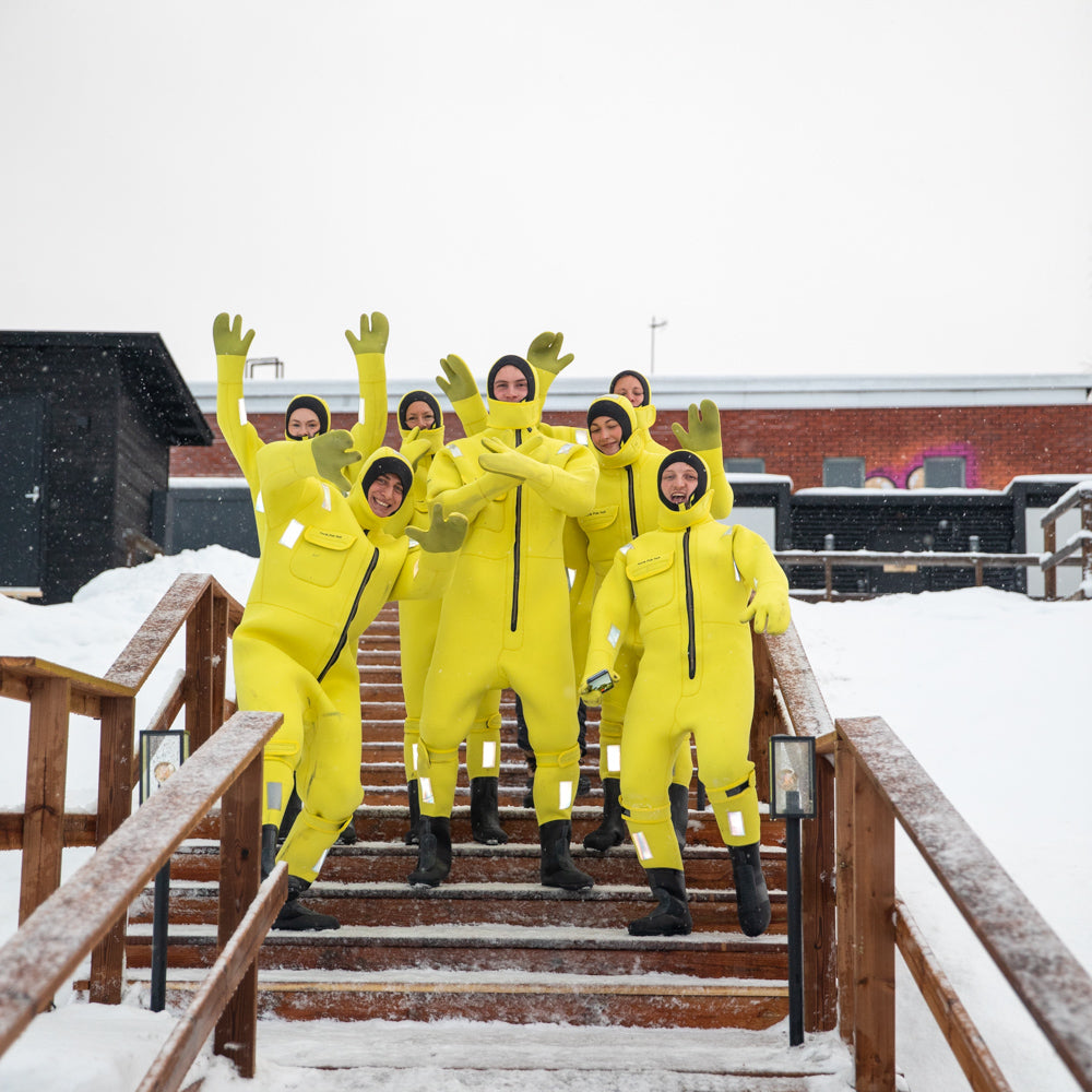 People getting ready to experience ice floating at Roiske Arctic Sauna Experience